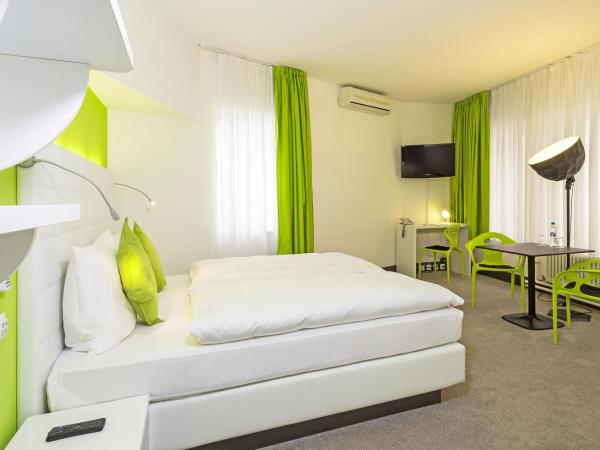 Hotel City Inn Basel : photo 1 de la chambre deluxe room with twin beds