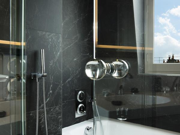 Le Narcisse Blanc : photo 4 de la chambre suite cléo