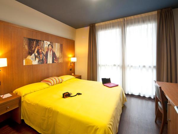 Ibis Styles Parma Toscanini : photo 1 de la chambre chambre double supérieure dans le bâtiment séparé