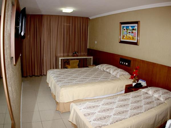 Amuarama Hotel : photo 5 de la chambre chambre quadruple exécutive