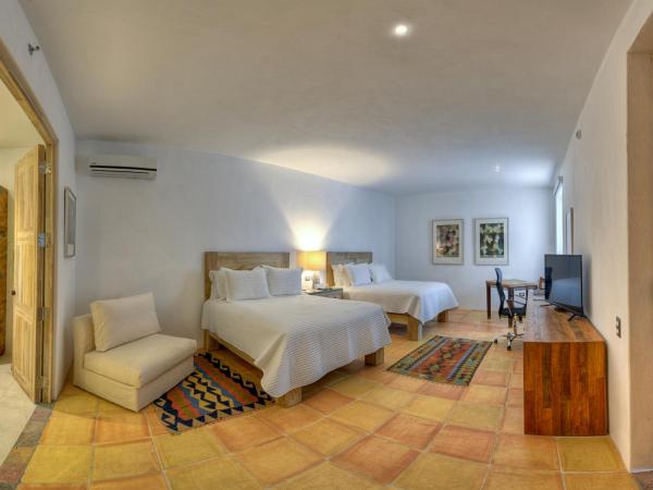 Hotel Boutique Casareyna : photo 3 de la chambre chambre deluxe avec 2 lits queen-size
