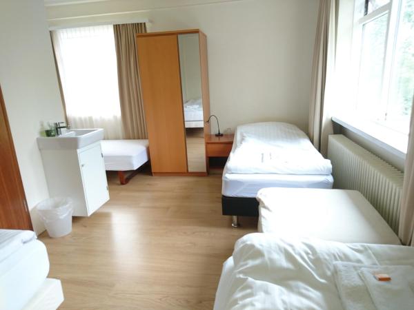 Alba Guesthouse : photo 6 de la chambre chambre quadruple avec salle de bains commune