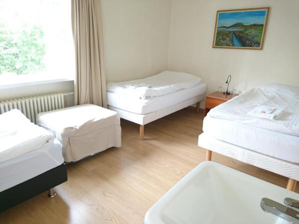 Alba Guesthouse : photo 7 de la chambre chambre quadruple avec salle de bains commune