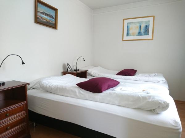 Alba Guesthouse : photo 4 de la chambre chambre triple avec salle de bains commune