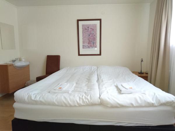 Alba Guesthouse : photo 9 de la chambre chambre quadruple avec salle de bains commune