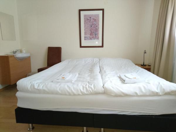 Alba Guesthouse : photo 10 de la chambre chambre quadruple avec salle de bains commune