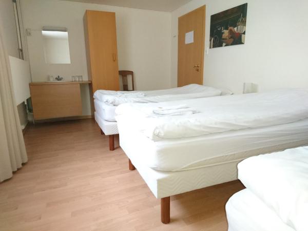 Alba Guesthouse : photo 9 de la chambre chambre triple avec salle de bains commune