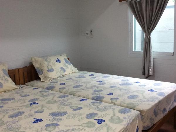 Sorn Waree Home place : photo 1 de la chambre chambre lits jumeaux