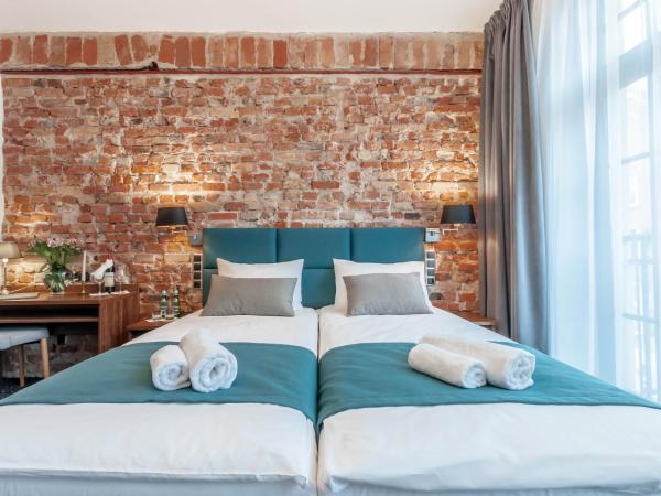 Liberum Residence Old Town : photo 3 de la chambre chambre deluxe double ou lits jumeaux