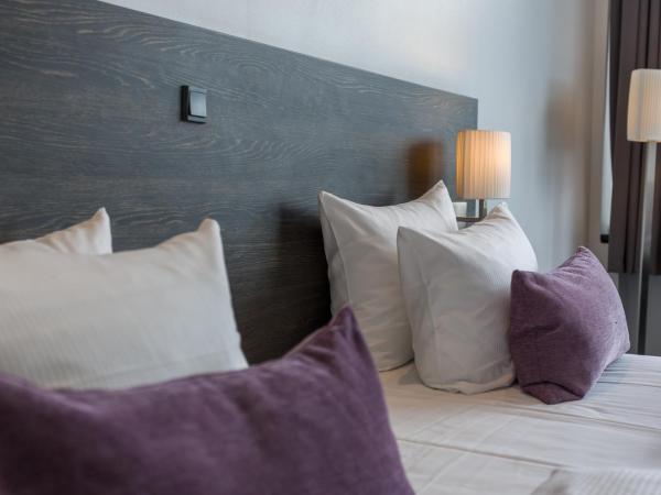 ProfilHotels Mercur : photo 3 de la chambre chambre lit king-size supérieure quatre