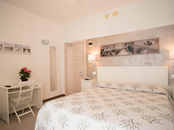 Hotel Conchiglia : photo 2 de la chambre chambre triple