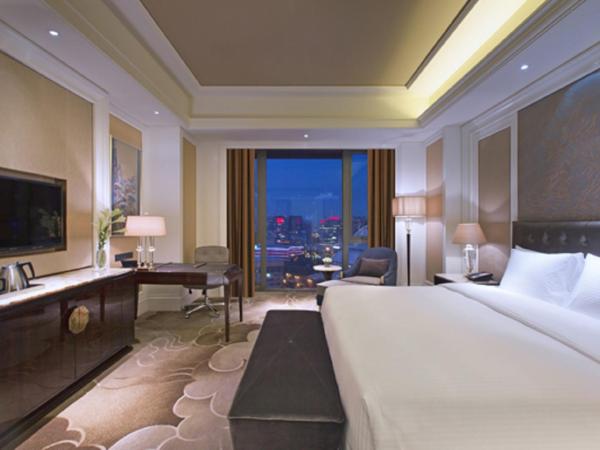 Wanda Vista Shenyang : photo 1 de la chambre chambre lit king-size de luxe gand