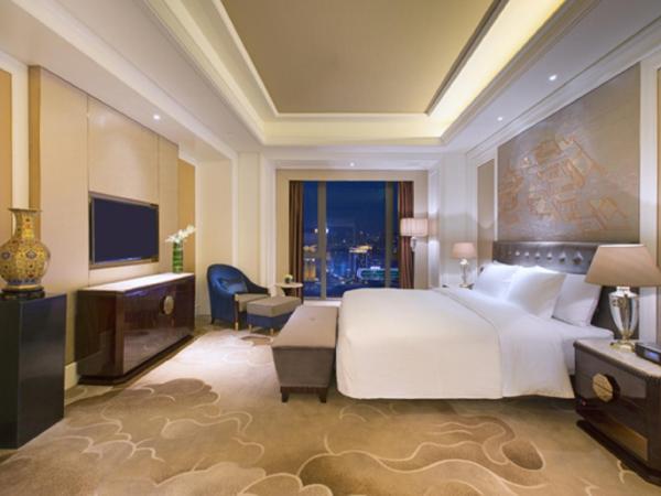 Wanda Vista Shenyang : photo 1 de la chambre chambre lit king-size exécutive