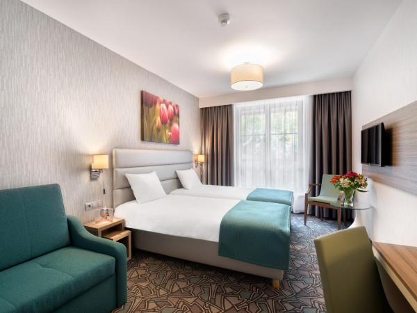 Golden Tulip Krakow Kazimierz : photo 1 de la chambre chambre lits jumeaux