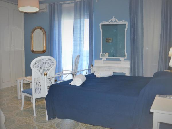 B&B A Due Passi Dal Mare : photo 3 de la chambre chambre triple supérieure - vue sur mer