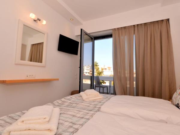 Island Dreams Rooms & Suites : photo 7 de la chambre chambre double ou lits jumeaux standard