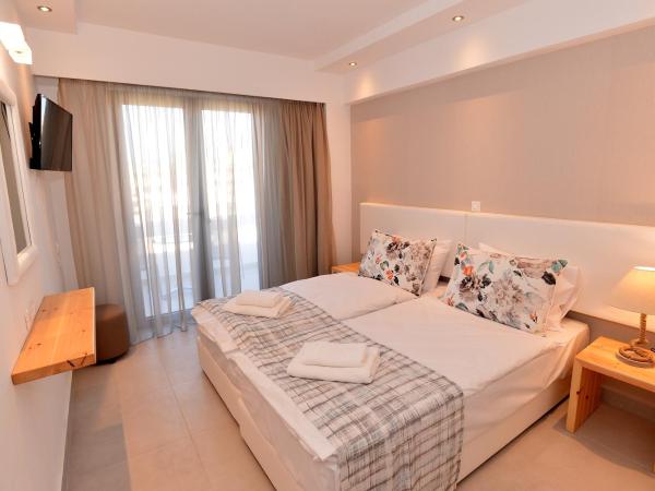 Island Dreams Rooms & Suites : photo 2 de la chambre chambre double ou lits jumeaux standard