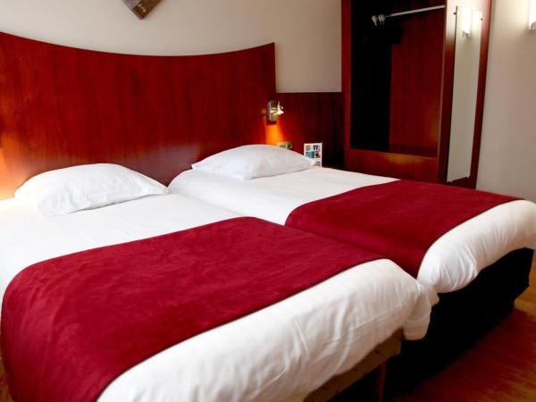 Logis Hotel Center : photo 3 de la chambre chambre lits jumeaux confort