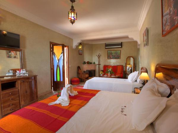 Villa Dar Mya Palmiers : photo 5 de la chambre suite - vue sur jardin