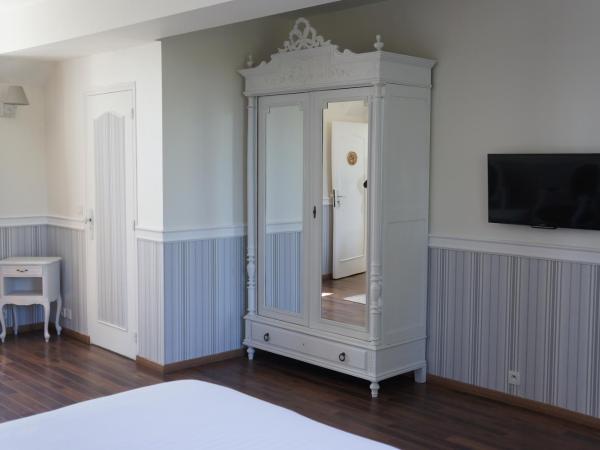 Manoir 1685 Saint Malo : photo 2 de la chambre chambre lit king-size deluxe