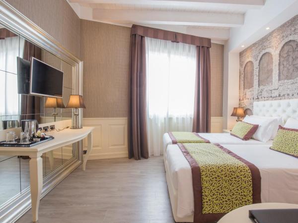 Hotel San Pietro : photo 10 de la chambre chambre lits jumeaux deluxe