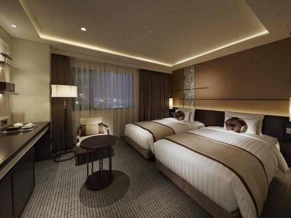 Royal Hotel Seoul : photo 1 de la chambre chambre lits jumeaux en angle premier