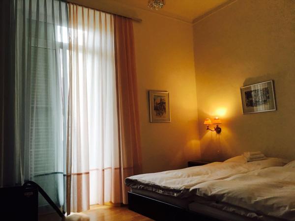 Bottega del Vino Guesthouse : photo 2 de la chambre chambre lits jumeaux avec salle de bains commune