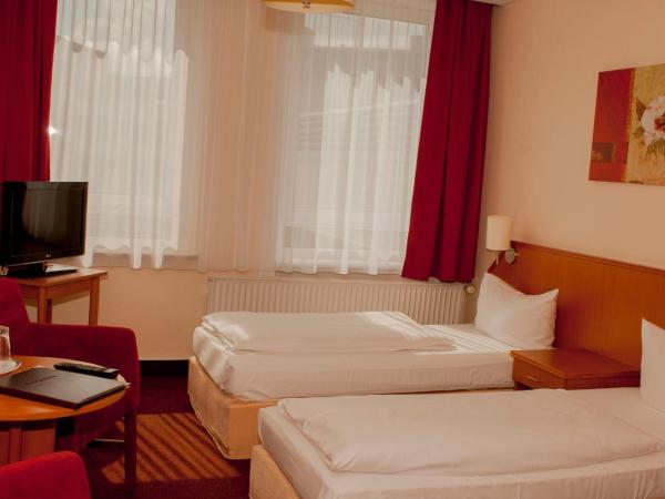 Hotel Residence am Hauptbahnhof : photo 7 de la chambre chambre lits jumeaux