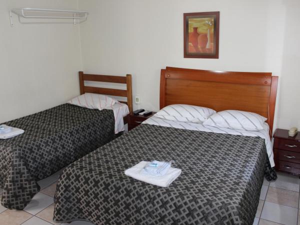 Hotel Turiassú : photo 1 de la chambre chambre lits jumeaux