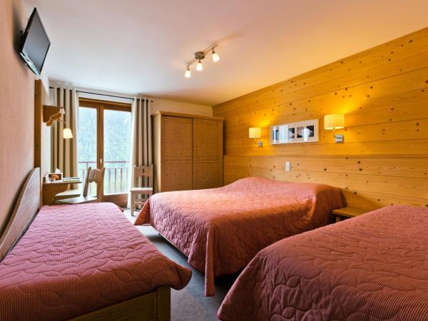 Le Roitelet : photo 7 de la chambre chambre quadruple supérieure avec balcon