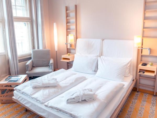 Hotel Bleibtreu Berlin by Golden Tulip : photo 6 de la chambre chambre supérieure lit queen-size