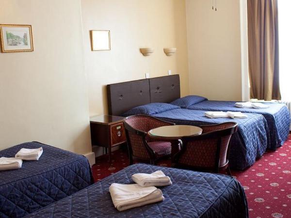 Rose Court Hotel : photo 2 de la chambre chambre quadruple