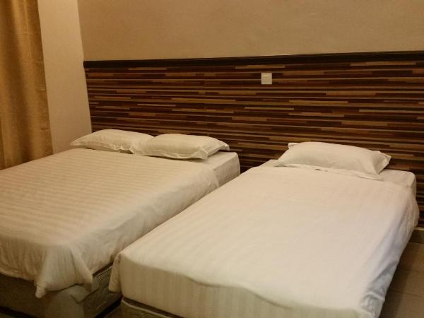 Hotel Iskandar : photo 1 de la chambre chambre familiale supérieure