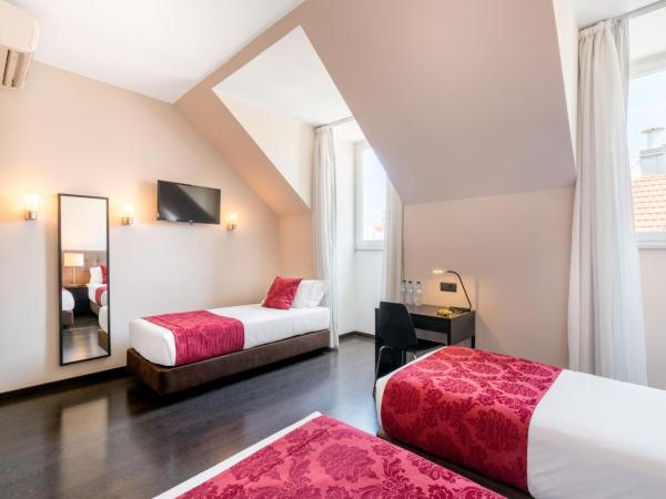 Rossio Garden Hotel : photo 1 de la chambre chambre triple exécutive