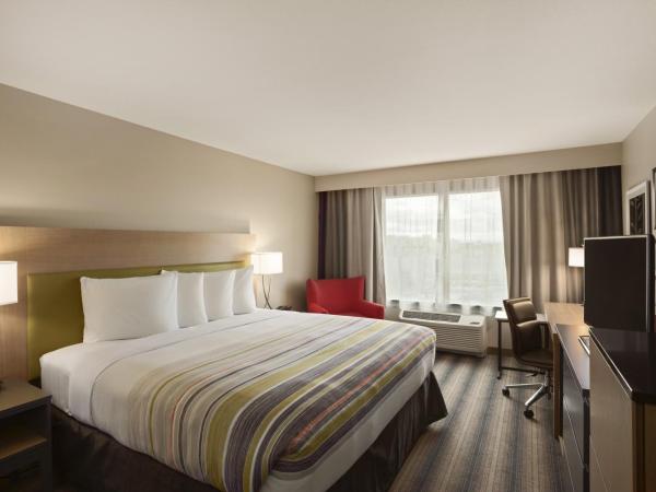 Country Inn & Suites by Radisson, San Antonio Medical Center, TX : photo 4 de la chambre chambre lit king-size - douche accessible en fauteuil roulant