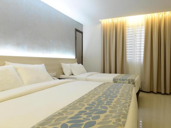 Samudra Hotel Kuching : photo 2 de la chambre chambre triple