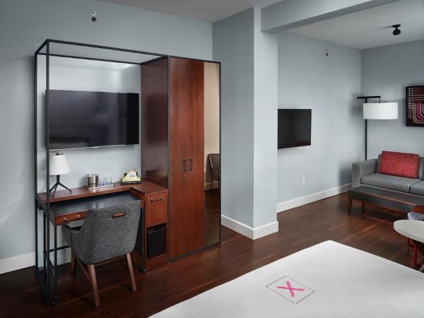 Axiom Hotel : photo 2 de la chambre chambre quadruple