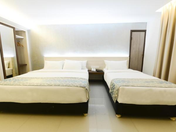 Samudra Hotel Kuching : photo 3 de la chambre chambre triple