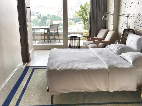 Witt Istanbul Suites : photo 2 de la chambre hébergement lit queen-size panoramique avec terrasse