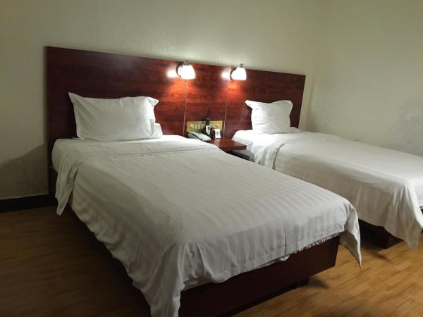 Guang Dong Hotel : photo 5 de la chambre chambre lits jumeaux standard