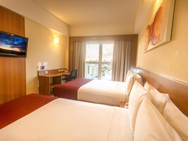 Praiamar Express Hotel : photo 2 de la chambre chambre standard avec 2 lits doubles