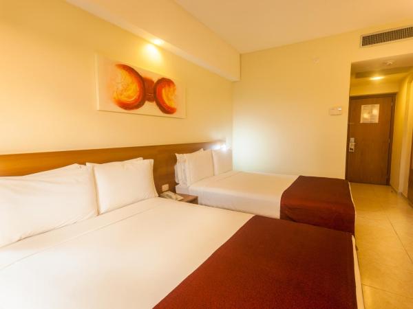 Praiamar Express Hotel : photo 7 de la chambre chambre supérieure avec 2 lits doubles - vue sur mer