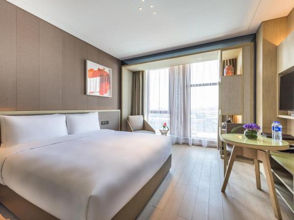 Novotel Shanghai Clover : photo 3 de la chambre chambre lit king-size deluxe