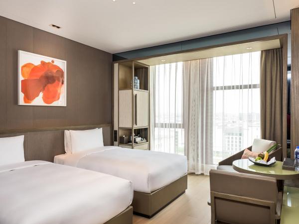 Novotel Shanghai Clover : photo 3 de la chambre chambre lits jumeaux deluxe