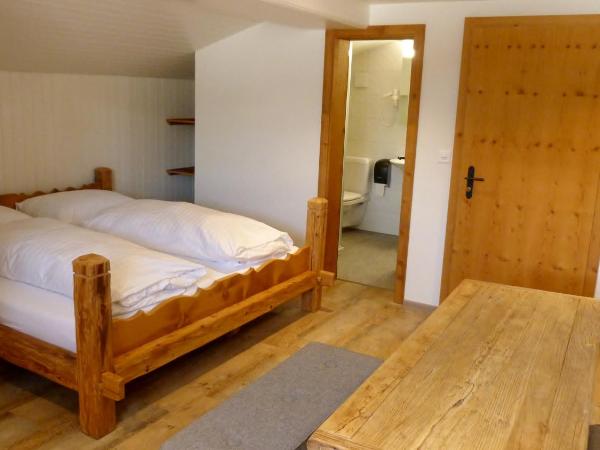 Berglodge Ristis : photo 1 de la chambre chambre quadruple avec salle de bains privative n° 1