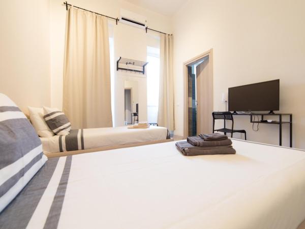 Romano Rooms : photo 3 de la chambre chambre double ou lits jumeaux avec salle de bains privative