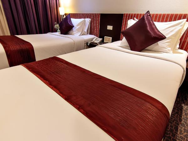 Bossotel Bangkok : photo 1 de la chambre chambre double ou lits jumeaux standard