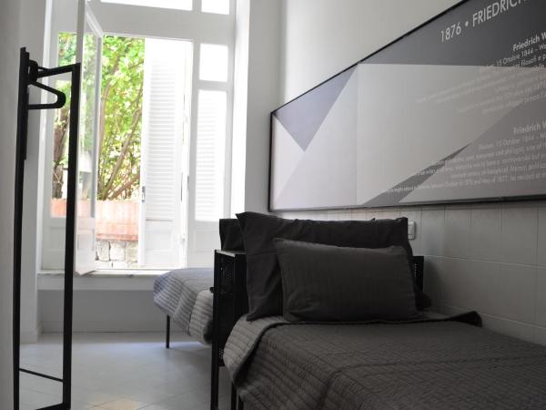 Muta House : photo 2 de la chambre chambre lits jumeaux