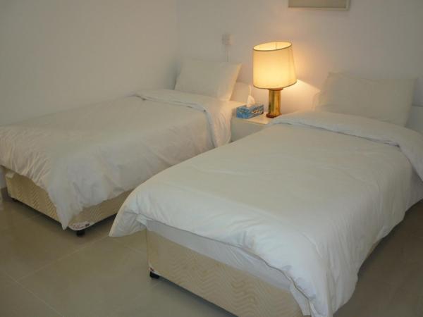 Qurum Beach Hotel : photo 1 de la chambre suite lits jumeaux