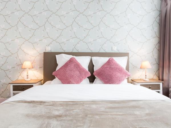 BnB City : photo 2 de la chambre chambre double avec lit d'appoint